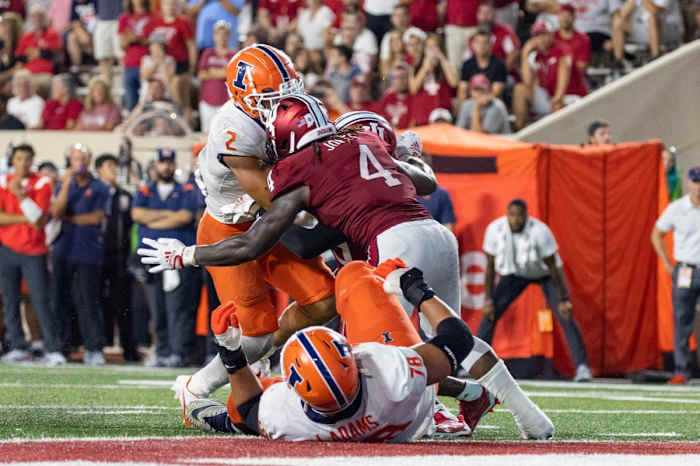 Indiana Hoosiers linebacker Cam Jones (4) stops Illinois Fighting Illini running back Chase Brown (2) on the goal line in the second half at Memorial Stadium.